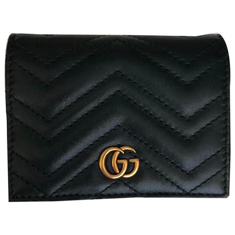 porte monnaie gucci femme noir|Portefeuille GG Marmont avec chaîne en cuir noir .